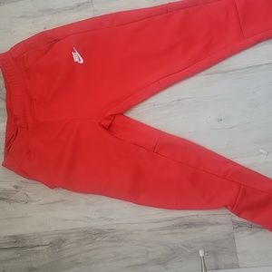 Red nike joggers